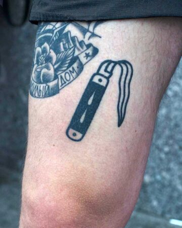 tattoo black and white knife on the leg male for men graphics minimalism