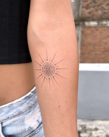 tattoo fineline on the hand thin line fine line black single needle minimalistic on the forearm under elbow