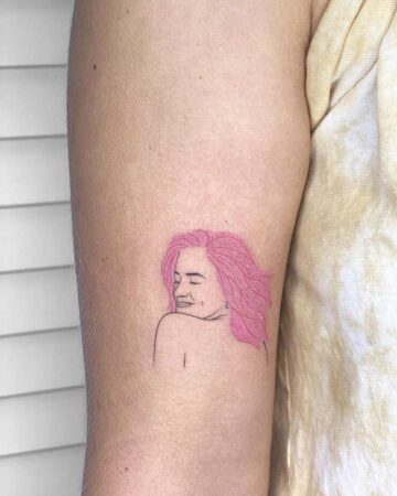 color mini tattoo on the arm on the shoulder, fine lines of a girl with pink hair