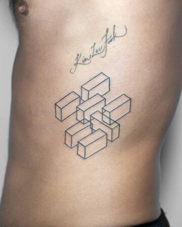Geometric tattoo with signature on person's side Done by tattoo artists in our fine line tattoo studio parlour shop Canggu, Bali