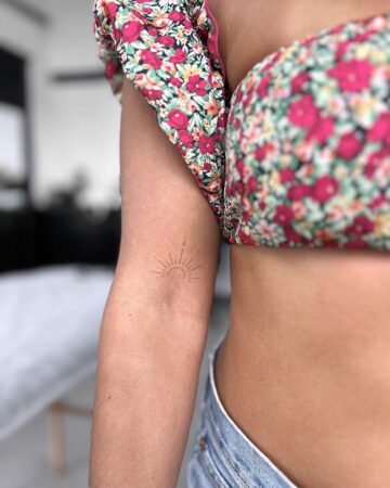 tattoo fineline on the hand thin line sun fine line black single needle minimalistic on the arm