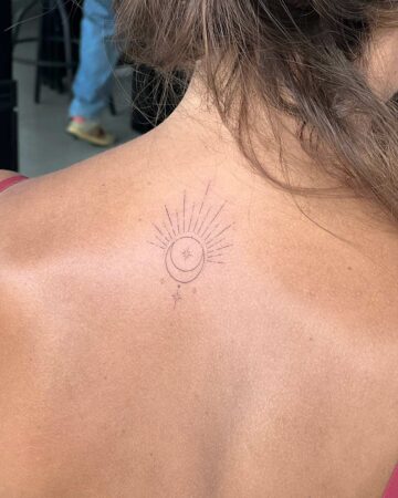tattoo moon fineline sun on the back woman thin line single needle bali