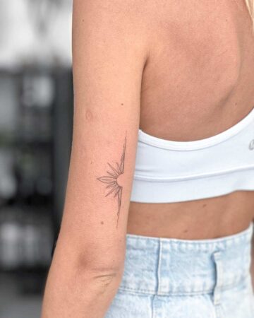 tattoo pattern fineline sun on the back woman thin line fine line black single needle minimalistic on the arm