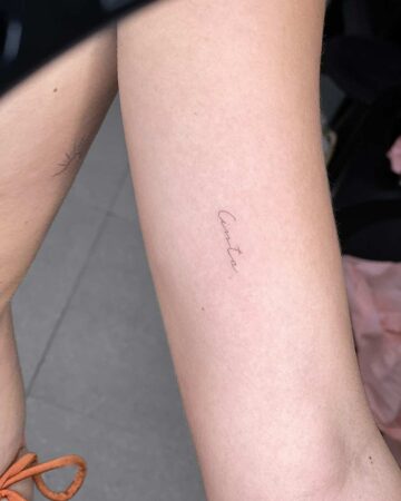 tattoo script lettering on the hand fineline cinta