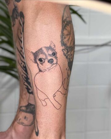 A unique dog tattoo featuring a Chihuahua with a detailed face and minimalist body outline. This dog tattoo is one of many featured in our dog tattoo gallery. Created in Canggu Bali.