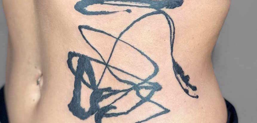 Abstract Minimalist Tattoo on the body side