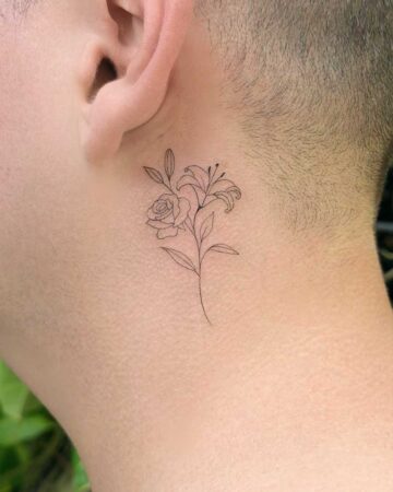 Minimalist floral tattoo featuring a delicate line drawing of a rose and a lily on the side of a person's neck, created in a multi style tattoo studio in Canggu Bali.
